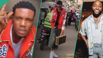 Abuja barber who desires to give Davido a free haircut leaks chat with singer, people react