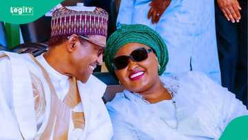 "Emotional moment": Photo of Aisha hugging Nigerian flag that draped Buhari's corpse melts hearts