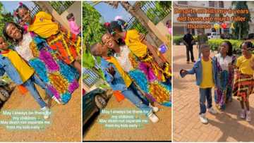 "God is really great": Reactions as small-sized Nigerian mum poses with her taller 6-year-old kids in video