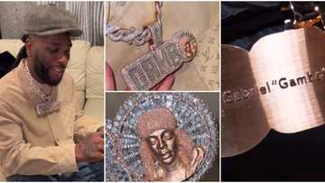 “Rest in peace”: Video as Burna Boy buys customised diamond chain in honour of his late friend Gambo