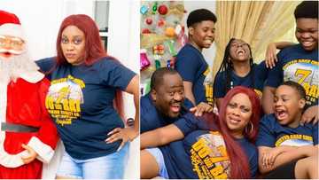 Desmond Elliot’s family show off their playful side as they pose in matching outfits for Christmas photos