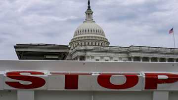 Asian stocks mixed, Wall St futures drop as US heads for shutdown