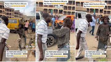 "E no go better for you": Pastor forcefully tries to heal mad woman on road, she insults him in funny video