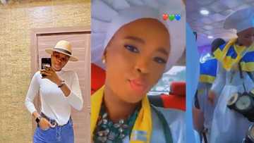 Cute lady from Celestial Church attracts attention online with her incredible skills on Yoruba talking drum