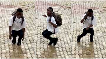 Amazing man with bag on his back dances while squatting, turns modern beats into Igbo dance, video goes viral