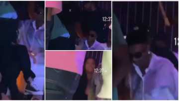Wizkid spotted stepping out of club with unknown lady in trending video, many wonder if she’s his baby mama