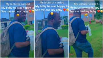 Nigerian male lecturer happily carries his female student's baby, video goes viral