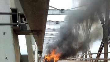 Just in: Tragedy as commercial bus catches fire on Niger bridge