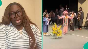 Lady schooling overseas trends online after rocking Yoruba outfit to her school's graduation