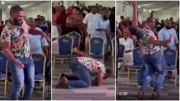 Video of tall young man's display of strange spiritual moves in church goes viral, gets people talking