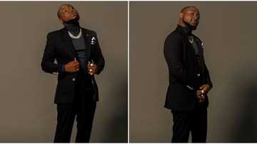 Nigerian music star Davido wows many as he switches up his style and rocks a suit (photos)