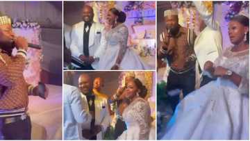 Couple caught unawares as singer Harrysong shows up at their wedding, surprises them with free performance