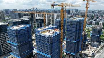 Chinese factory, consumer activity slow amid economy struggles