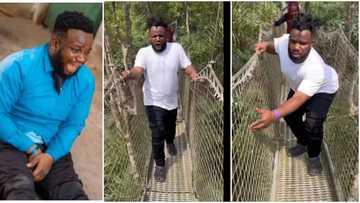 Sabinus expresses fright, calls on his maker as he walks on rope bridge in Lagos, video goes viral, many react