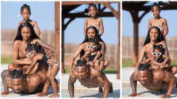 "My family is growing": Man carries pregnant wife and 2 daughters on his back, does push-ups in video