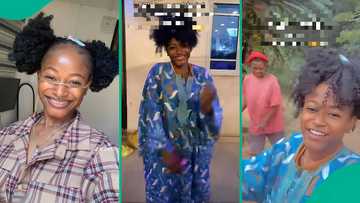 "From Abuja to Enugu": Nigerian lady travels in late dad’s outfit to surprise mother, video trends