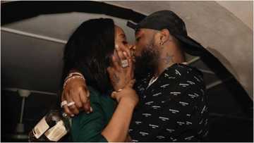 Davido shares photo of himself passionately kissing Chioma