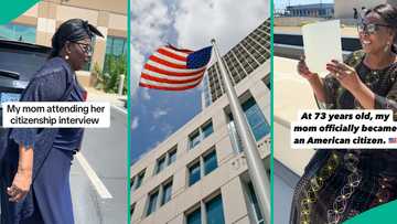 Woman, 73, gets US citizenship, rejoices, her grandchildren wave American flag