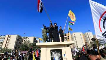 Protesters scale walls, smash windows as they storm US embassy in Baghdad after airstrikes