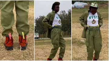 "N3,500 to slim-fit": Lady who got oversized khaki in NYSC camp uses clips to hold the waist, video goes viral