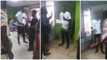 Man shouts at female banker, seizes bank equipment over a deduction to his account, video goes viral