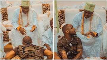 Davido rocks camo as he visits Ooni of Ife, pays homage