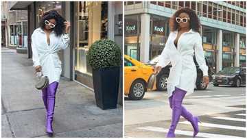 Famous radio/TV presenter spotted in a purple spandex Balenciaga boots in New York, it reportedly costs N500,000 (photos)