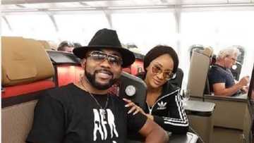 Banky W and Adesua heads to South Africa, shares photo