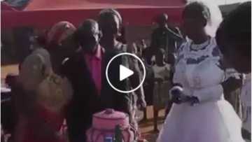 Forced marriage? Nigerian woman looks unhappy on her wedding day (Video)