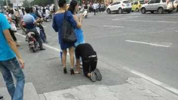 Shocking! Man turns into a dog on the street (photos)