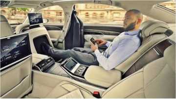 2016 Mr Ideal Nigeria photoshops himself into 2018 Audi A8 to deceive people (photos)
