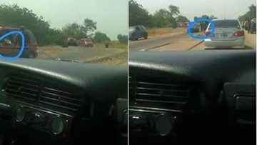 Police Officers Pictured Taking Bribe During Highway Patrol