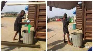 Sad! See how this young Nigerian boy was spotted eating from a refuse dump (photos)