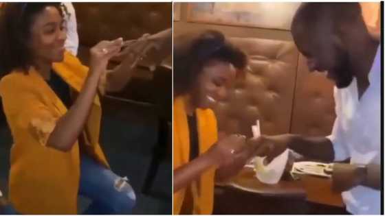 Tired of waiting for question that never comes, lady goes down on her knee to propose marriage to her long time boyfriend in public (video)