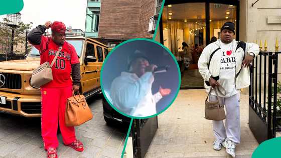 Unclad lady with massive backside whines waist for Cubana Chiefpriest as he performs at Lagos club