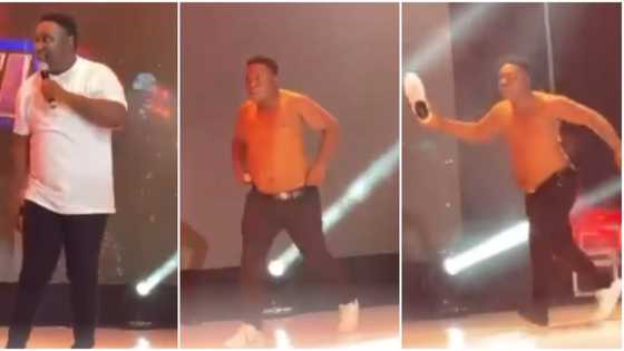 Comedian I Go Tuk goes wild, removes shirt, shoes on stage as E-money, others gift him over N5m at AY's show