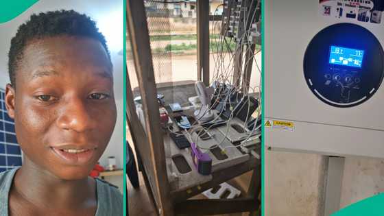 Man who uses solar energy for charging business shows watt consumption after plugging in many phones