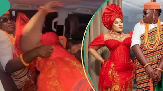 "She no even package": Reactions as Nkechi Blessing struggles to get in car because of corset dress