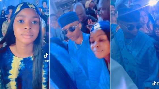 "I'm obsessed with him": Video as lady drools over Wizkid at mother's funeral, approaches singer
