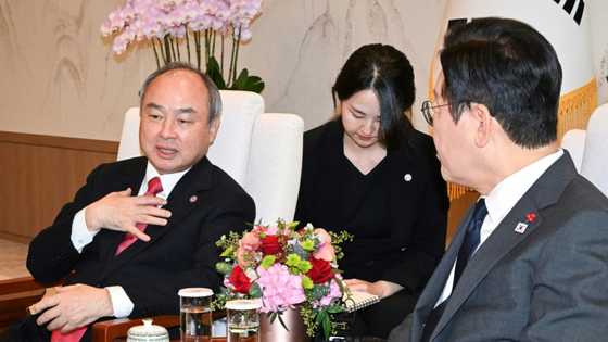 Softbank's Son says super AI could make humans like fish, win Nobel Prize