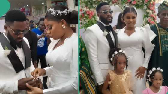 Passengers watch as man gets married to his wife at Murtala Muhammed International Airport Terminal