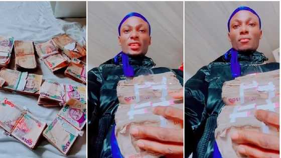 "I'm tired of saving money, I want to squander, is Dangote not man like me?" Man says, displays cash in video