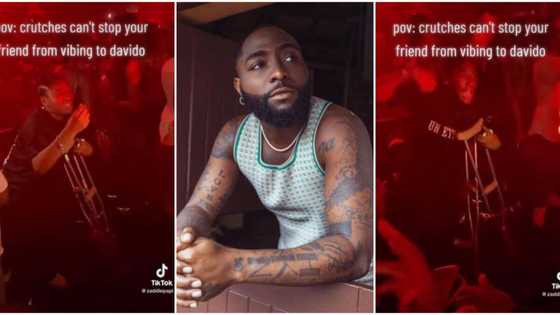 “Nothing can stop the vibe”: Reactions as clip of lady on crutches going gaga to Davido’s song goes viral