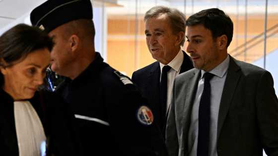 French luxury mogul Arnault defiant at ex-spy chief trial