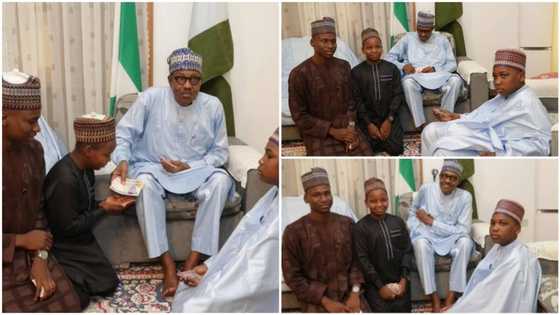 Pictures of Buhari sharing Naira notes with children cause stir on social media, see what Nigerians call the president