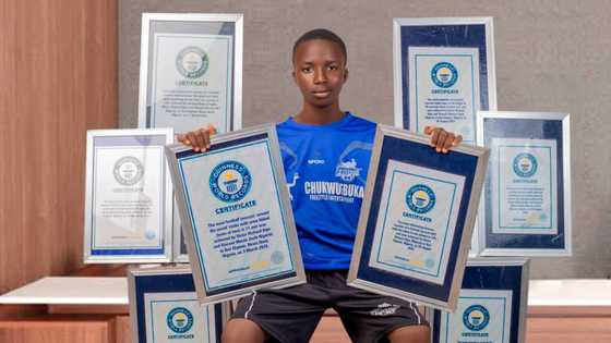 Just like Hilda Baci: 15-year-old Nigerian boy with 8 Guinness World Records poses with certificates in photos
