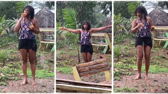 "This is my dream": Grown up lady in black skirt plays inside heavy rain like a child, video goes viral