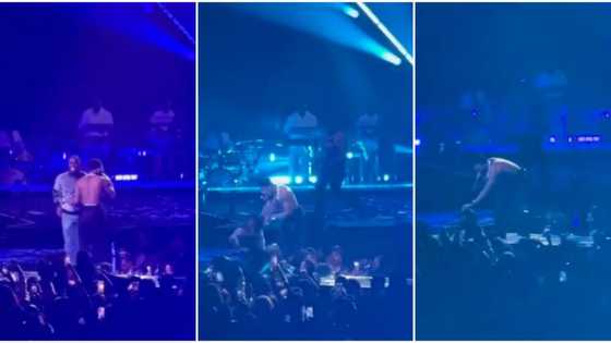 “Burna Boy would have kicked him”: Wizkid reacts nicely as fan runs on stage to hug him, video trends