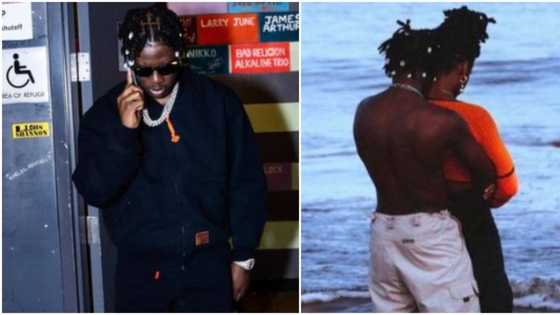“Is it what we’re thinking?”: Fans react to photos of Rema seen at a beach with a mystery woman