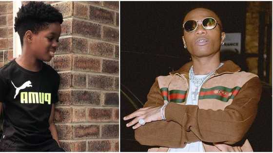 Tell my dad I rocked it better: Wizkid's 1st son Tife wears singer's shoes, shares photo online